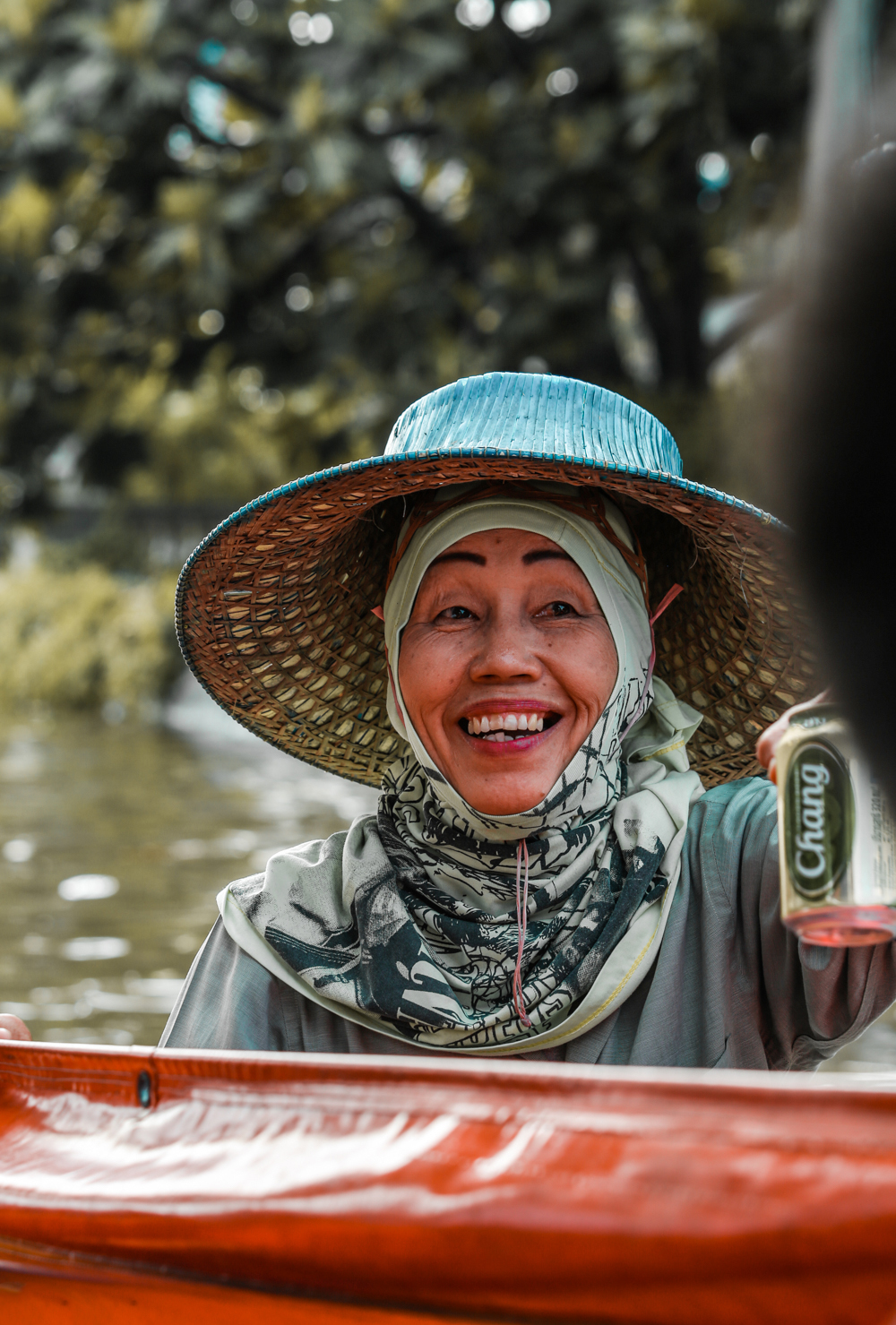 Vendor at floating market in Bangkok Thailand @howfarfromhome